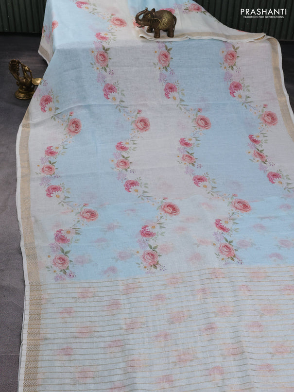 Pure linen saree light blue and cream with allover floral digital prints and zari woven border