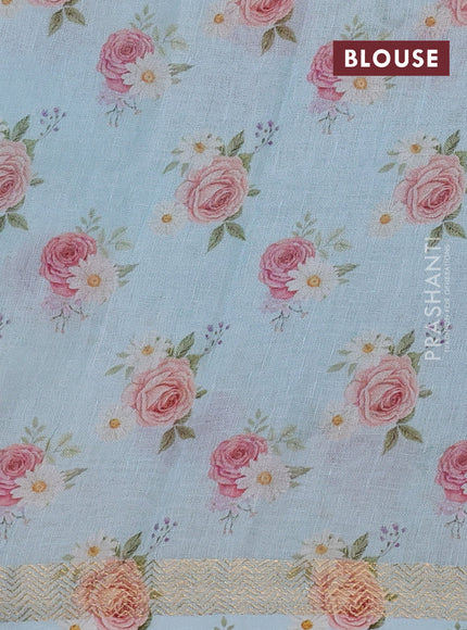 Pure linen silk saree light blue and cream with allover floral digital prints and zari woven border