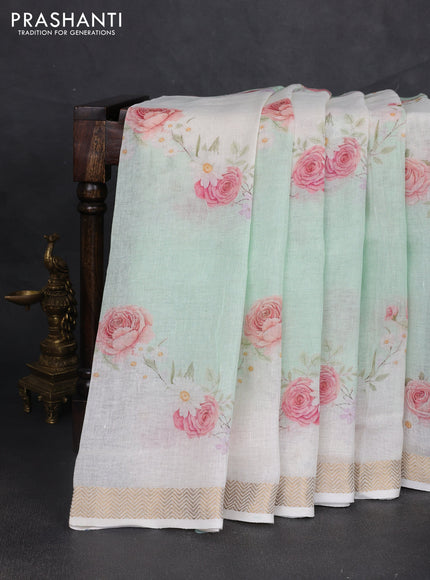 Pure linen silk saree teal green shade and cream with allover floral digital prints and zari woven border