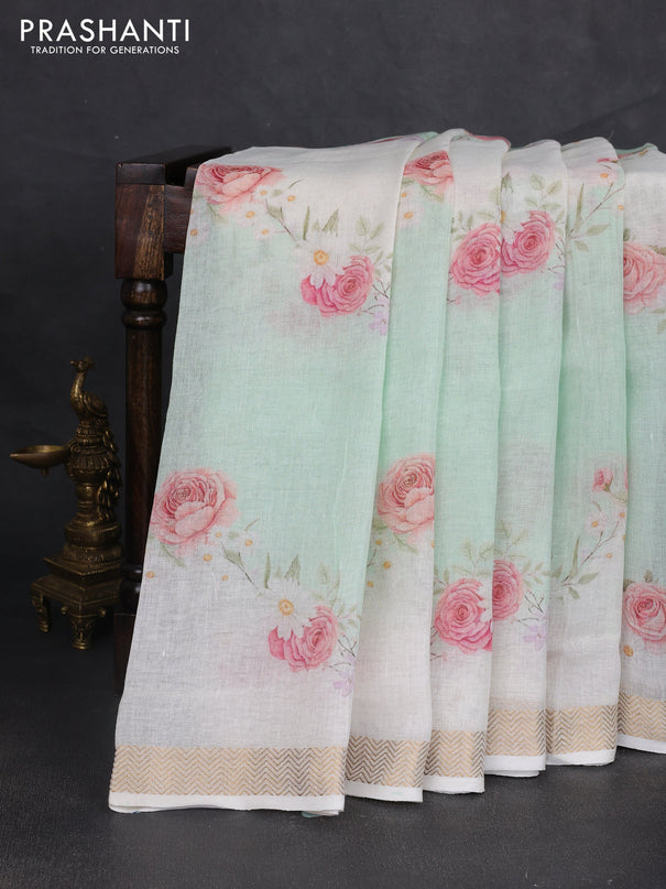 Pure linen saree teal green shade and cream with allover floral digital prints and zari woven border