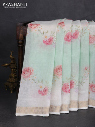 Pure linen saree teal green shade and cream with allover floral digital prints and zari woven border