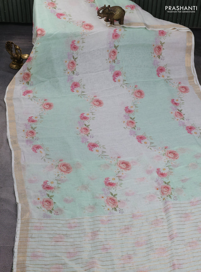 Pure linen silk saree teal green shade and cream with allover floral digital prints and zari woven border