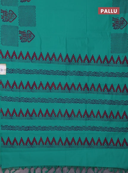 Semi silk cotton saree teal green and purple with plain body and printed border
