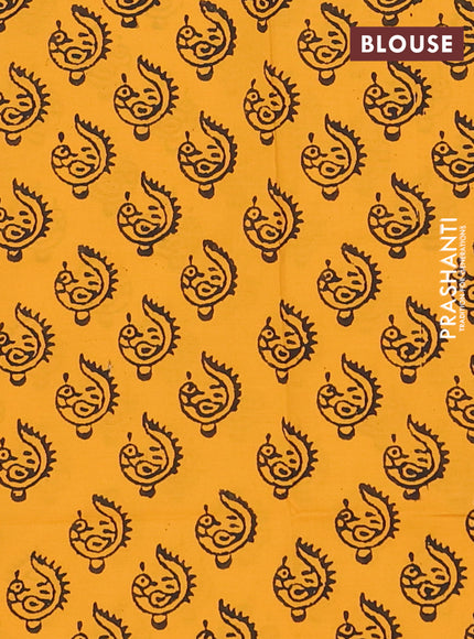 Semi silk cotton saree grey and yellow with plain body and peacock butta border