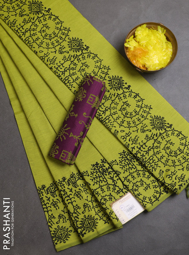 Semi silk cotton saree fluorescent green and purple with butta prints and warli printed border