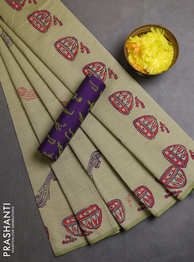 Semi silk cotton saree pista green and violet with musical instrument butta prints and butta printed border