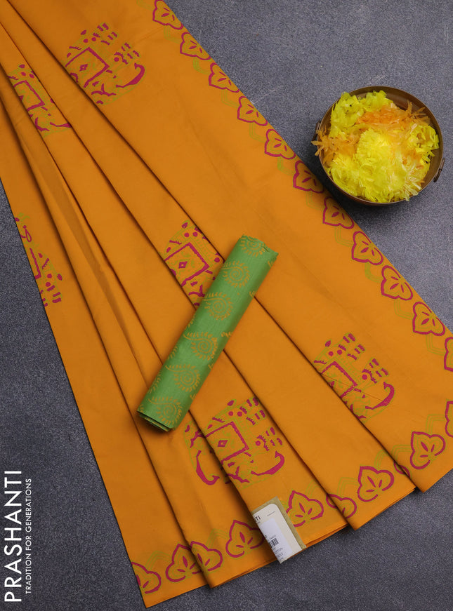 Semi silk cotton saree yellow and light green with butta prints and printed border