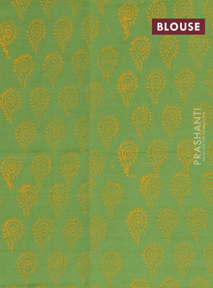Semi silk cotton saree yellow and light green with butta prints and printed border