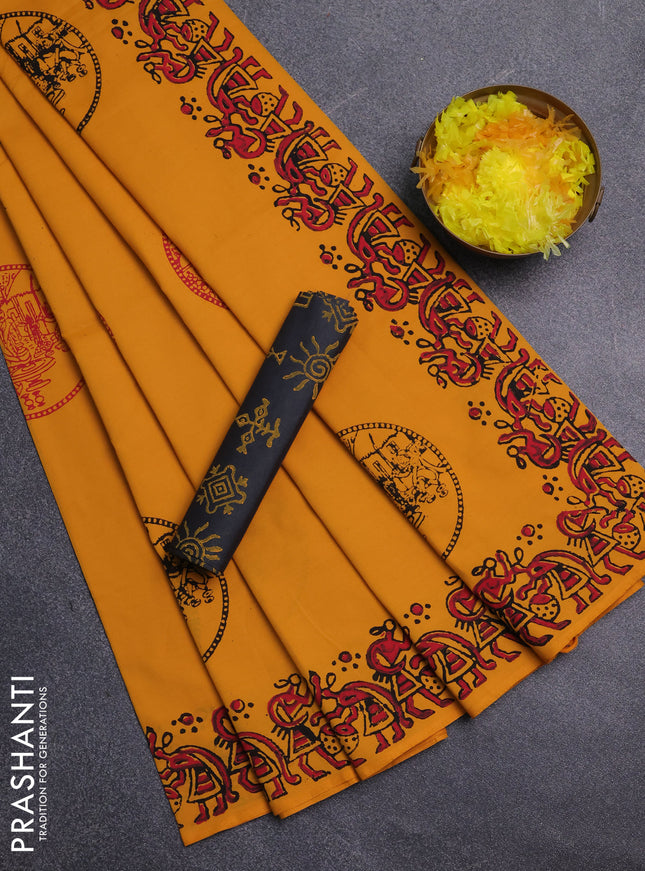 Semi silk cotton saree mango yellow and grey with butta prints and warli printed border