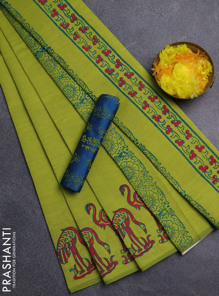 Semi silk cotton saree fluorescent green and cs blue with plain body and butta printed border