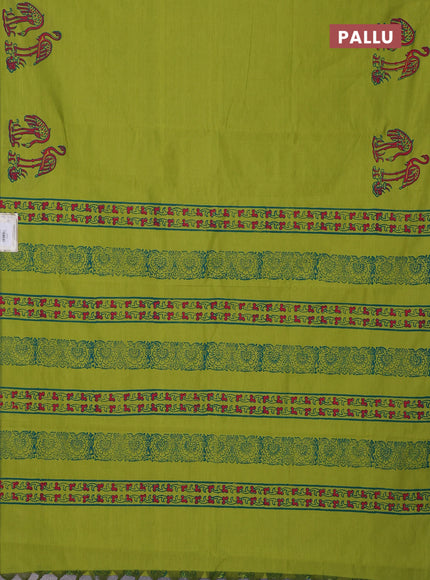 Semi silk cotton saree fluorescent green and cs blue with plain body and butta printed border