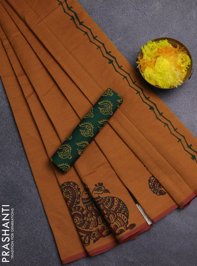 Semi silk cotton saree dark mustard and green with annam butta prints and butta printed border