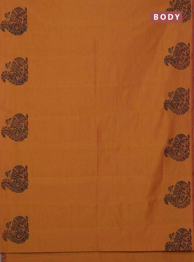 Semi silk cotton saree dark mustard and green with annam butta prints and butta printed border