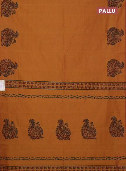 Semi silk cotton saree dark mustard and green with annam butta prints and butta printed border