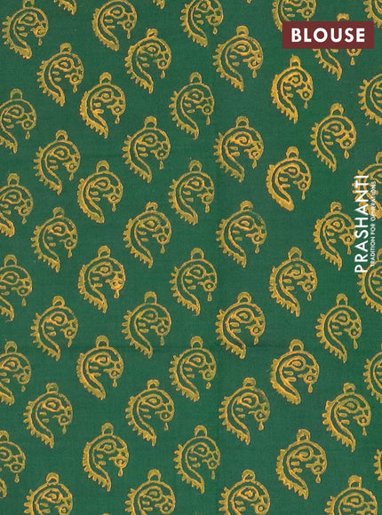 Semi silk cotton saree dark mustard and green with annam butta prints and butta printed border