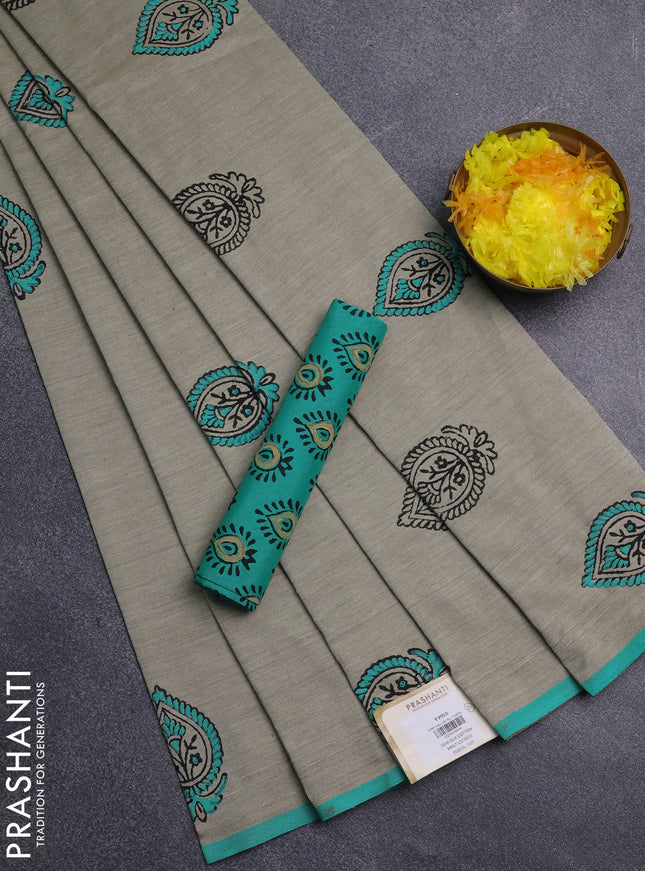 Semi silk cotton saree beige and teal green shade with butta prints and butta printed border
