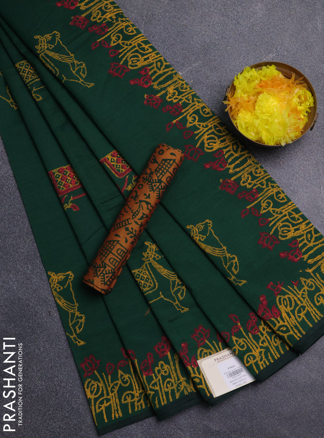 Semi silk cotton saree green and mustard yellow with pichwai butta prints and printed border