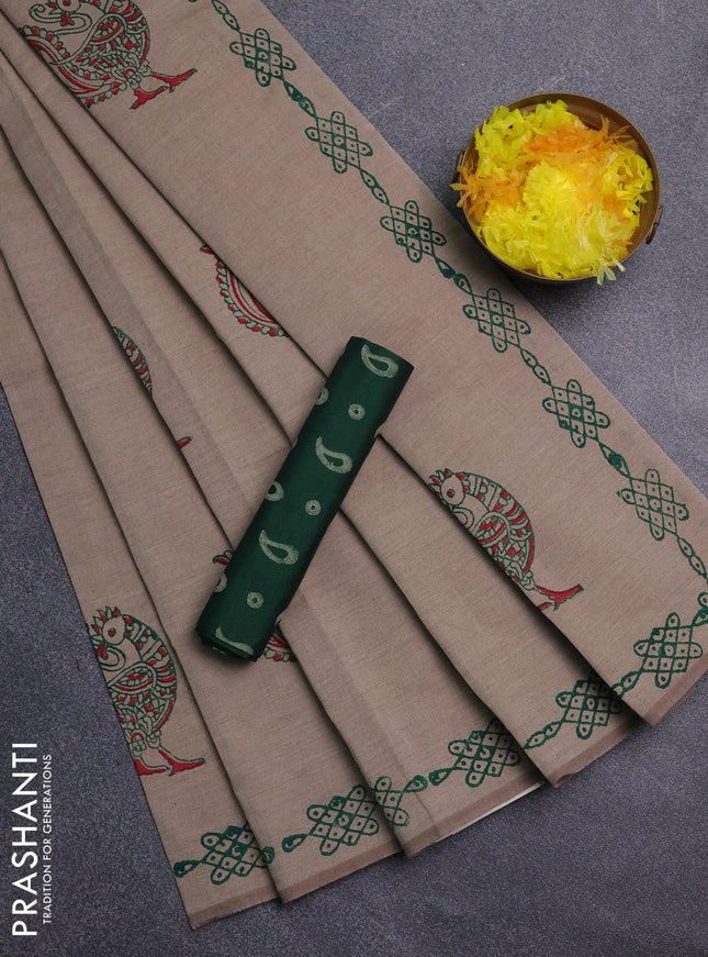 Semi silk cotton saree beige and green with peacock butta prints and printed border