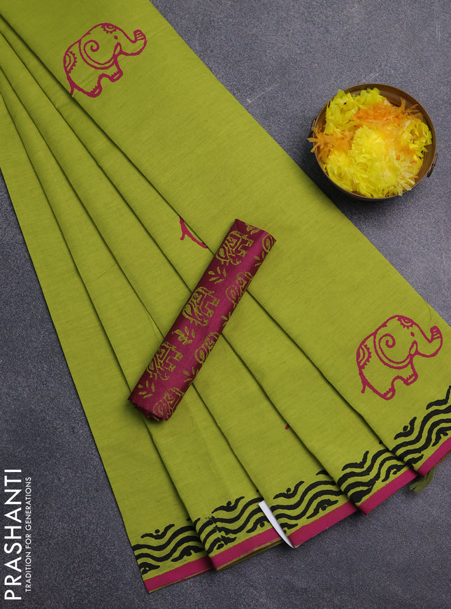Semi silk cotton saree light green and magenta pink with butta prints and printed border