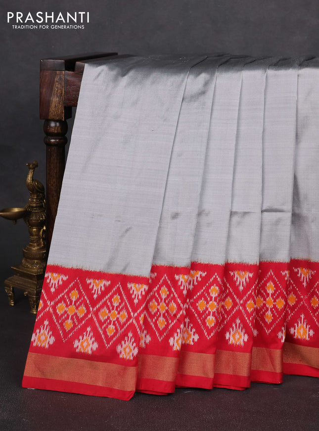 Pochampally silk saree grey and red with plain body and long ikat woven zari border