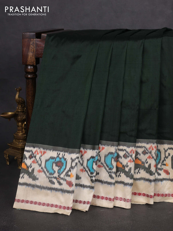 Pochampally silk saree bottle green and cream with plain body and long ikat woven border