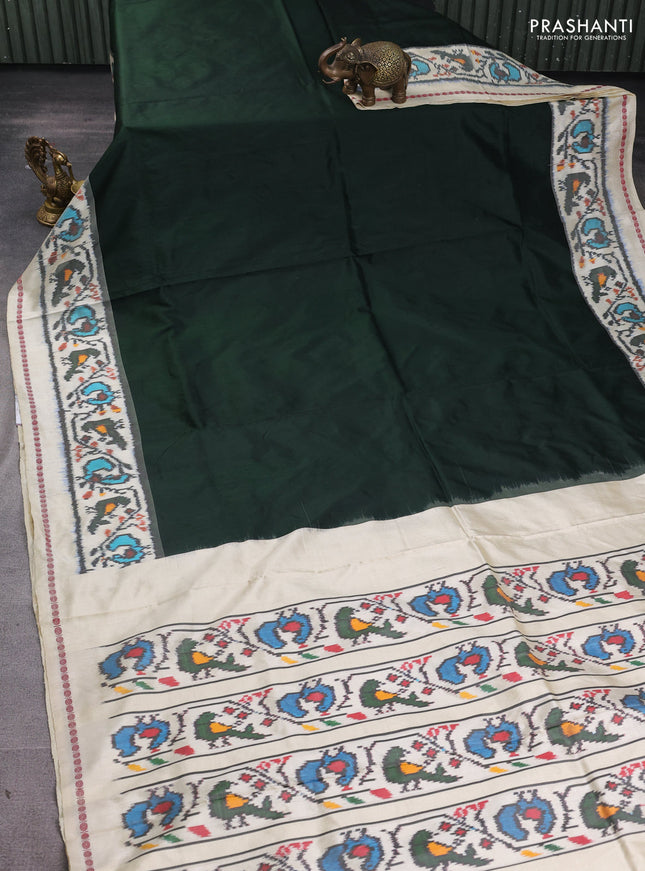 Pochampally silk saree bottle green and cream with plain body and long ikat woven border