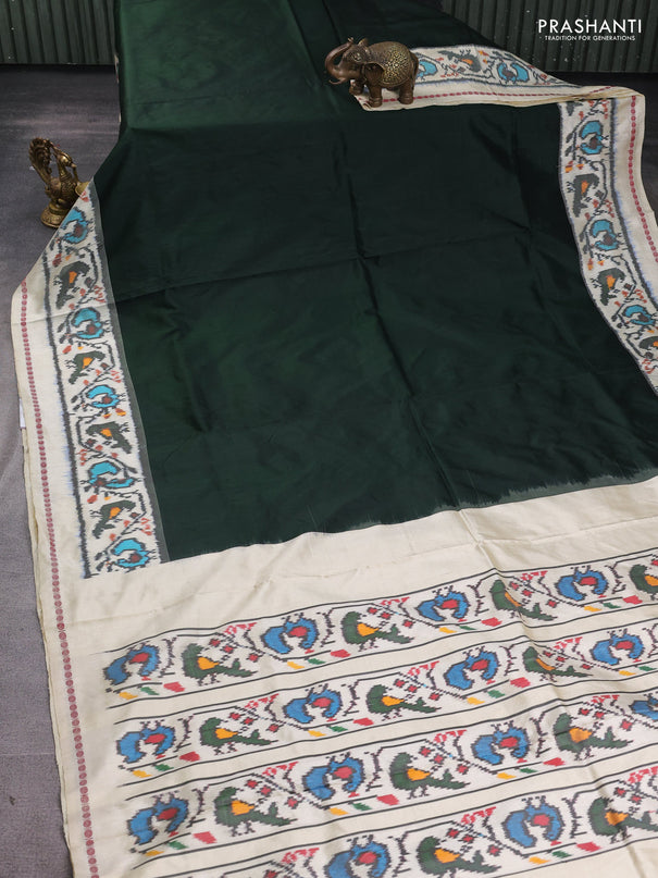 Pochampally silk saree bottle green and cream with plain body and long ikat woven border