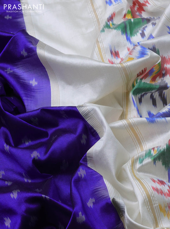 Pochampally silk saree blue and off white with allover ikat butta weaves and ikat woven zari border