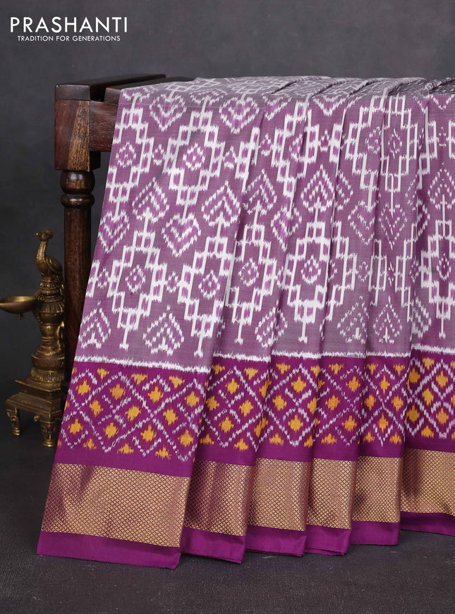 Pochampally silk saree pastel purple and purple with allover ikat weaves and ikat woven zari border