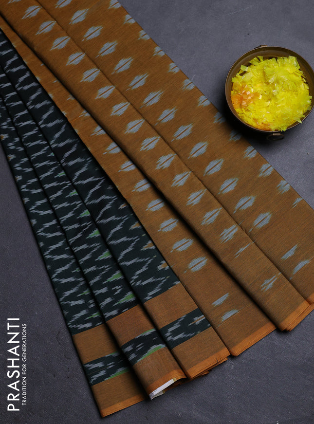 Ikat cotton saree bottle green and dark mustard with allover ikat weaves and rettapet ikat border