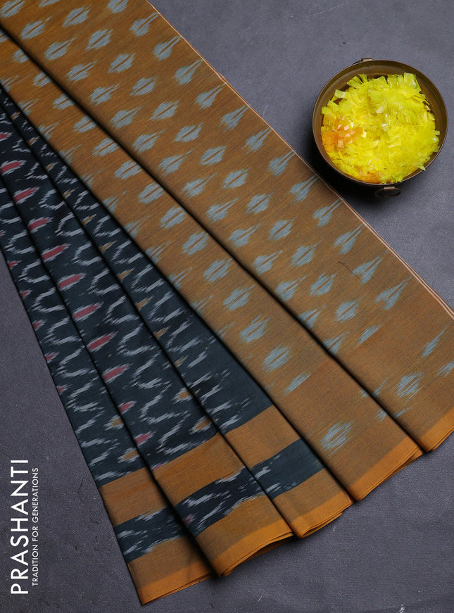 Ikat cotton saree peacock green and dark mustard with allover ikat weaves and rettapet ikat border
