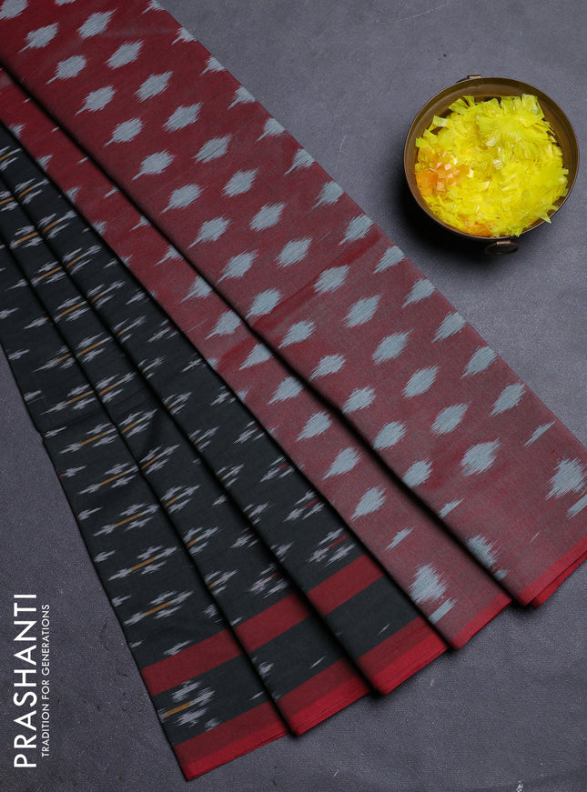 Ikat cotton saree black shade and red with allover ikat butta weaves and rettapet ikat border