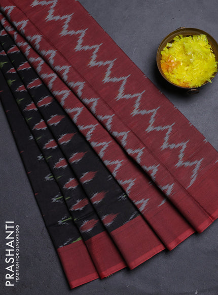 Ikat cotton saree black shade and rust shade with allover ikat butta weaves and simple border