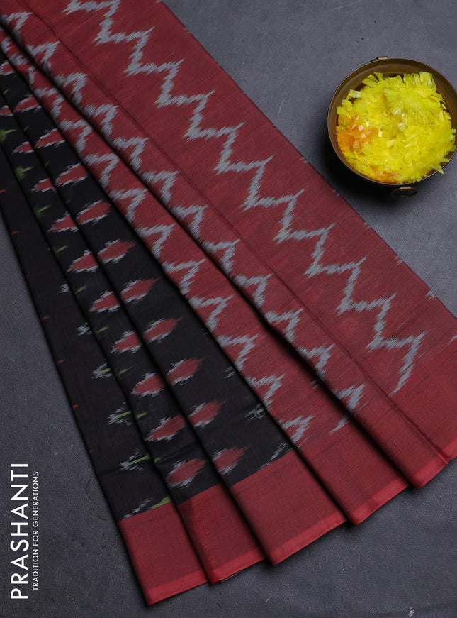 Ikat cotton saree black shade and rust shade with allover ikat butta weaves and simple border