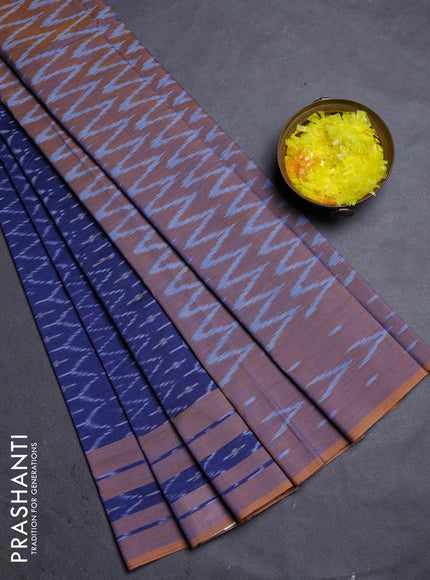 Ikat cotton saree blue and dark mustard with allover ikat weaves and rettapet ikat border