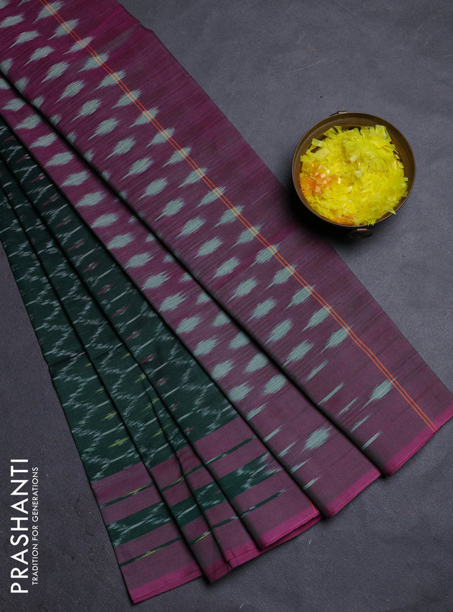 Ikat cotton saree bottle green and purple with allover ikat weaves and rettapet ikat border