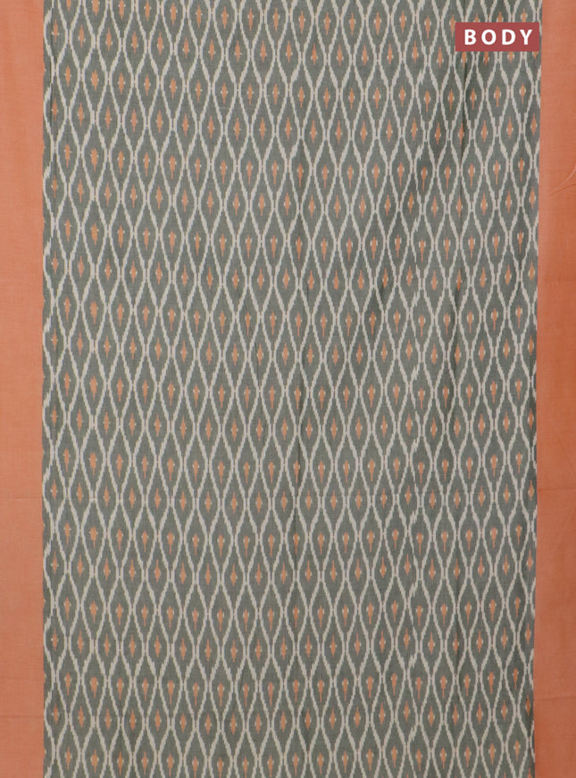 Ikat cotton saree green shade and orange with allover ikat weaves and simple border