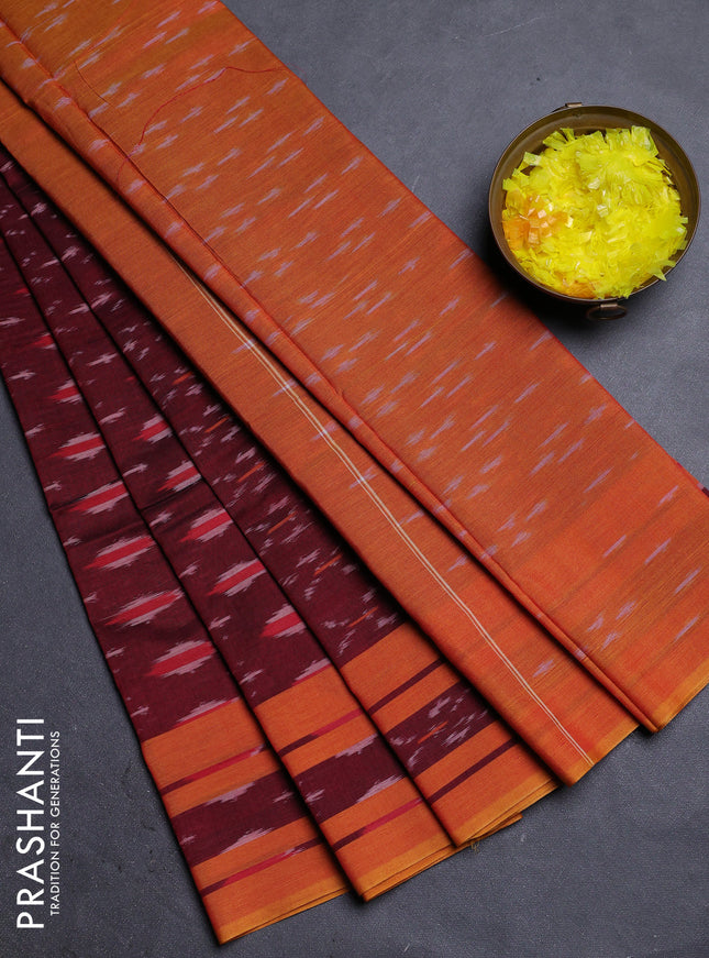 Ikat cotton saree maroon and dark mustard with allover ikat weaves and rettapet ikat border