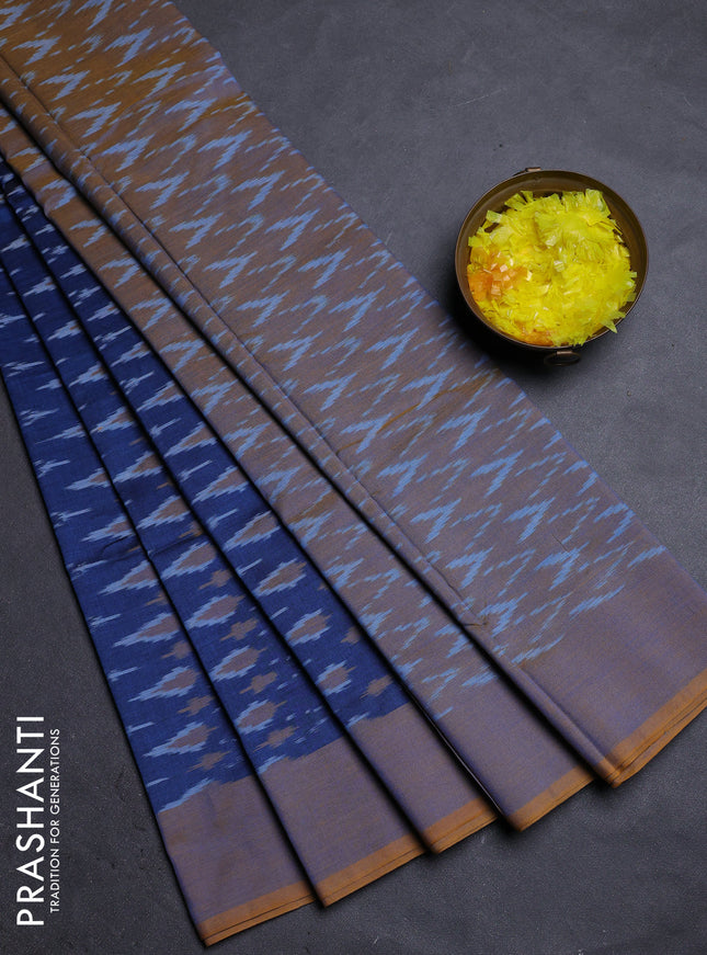 Ikat cotton saree blue and dark mustard with allover ikat weaves and simple border