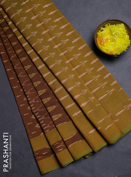 Ikat cotton saree dark mustard and mustard green with allover ikat weaves and rettapet ikat border