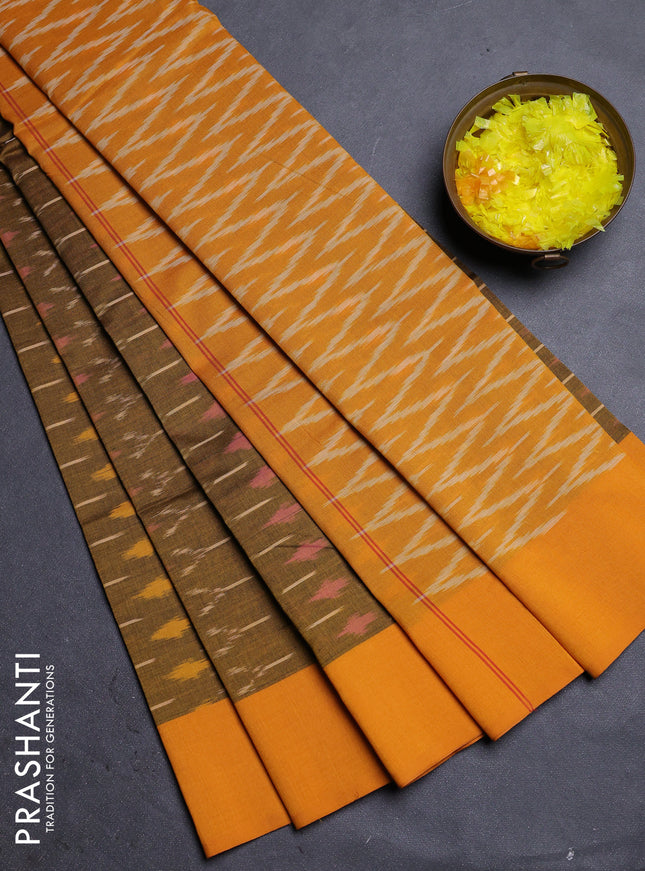 Ikat cotton saree dark mustsrd and yellow with allover ikat weaves and simple border