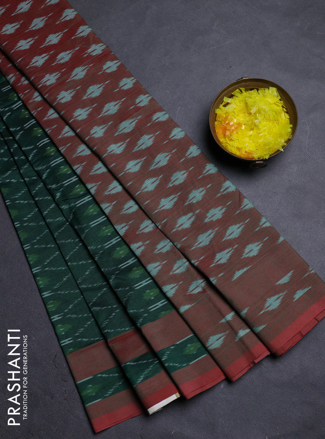 Ikat cotton saree green and red shade with allover ikat weaves and rettapet ikat border