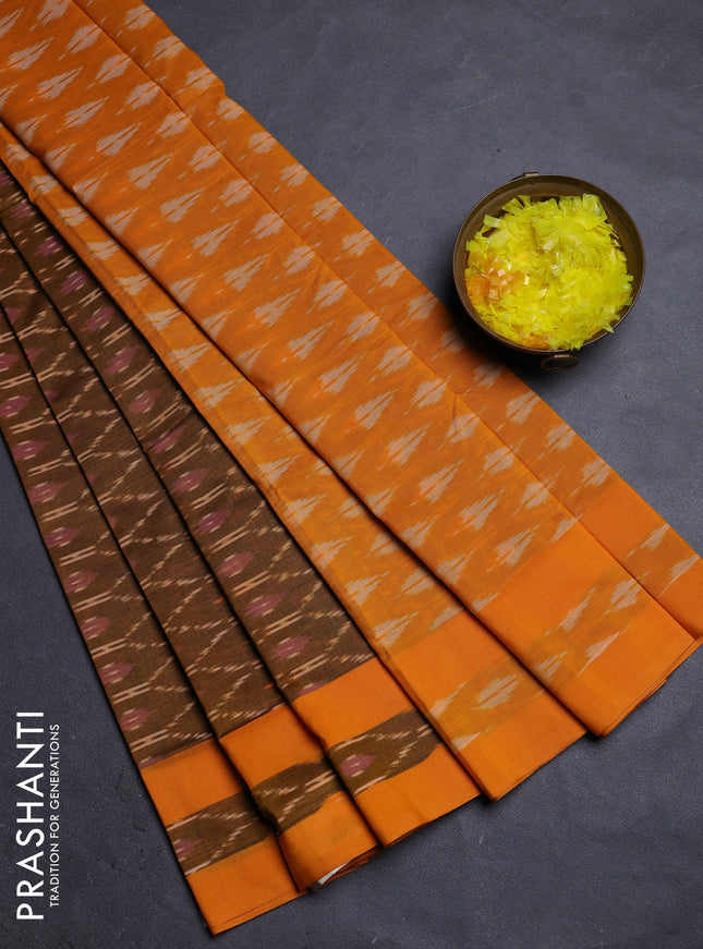Ikat cotton saree dark mustard and mango yellow with allover ikat weaves and rettapet ikat border