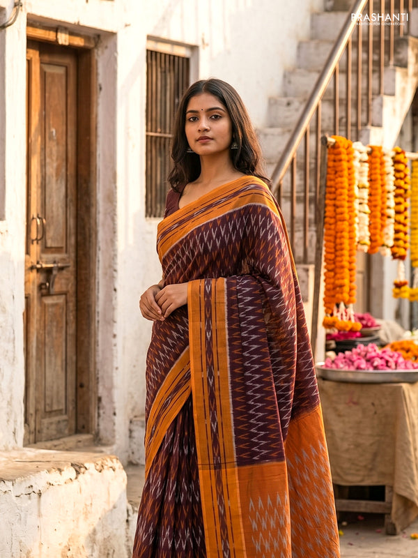 Ikat cotton saree deep maroon and dark mustard with allover ikat weaves and rettapet ikat border