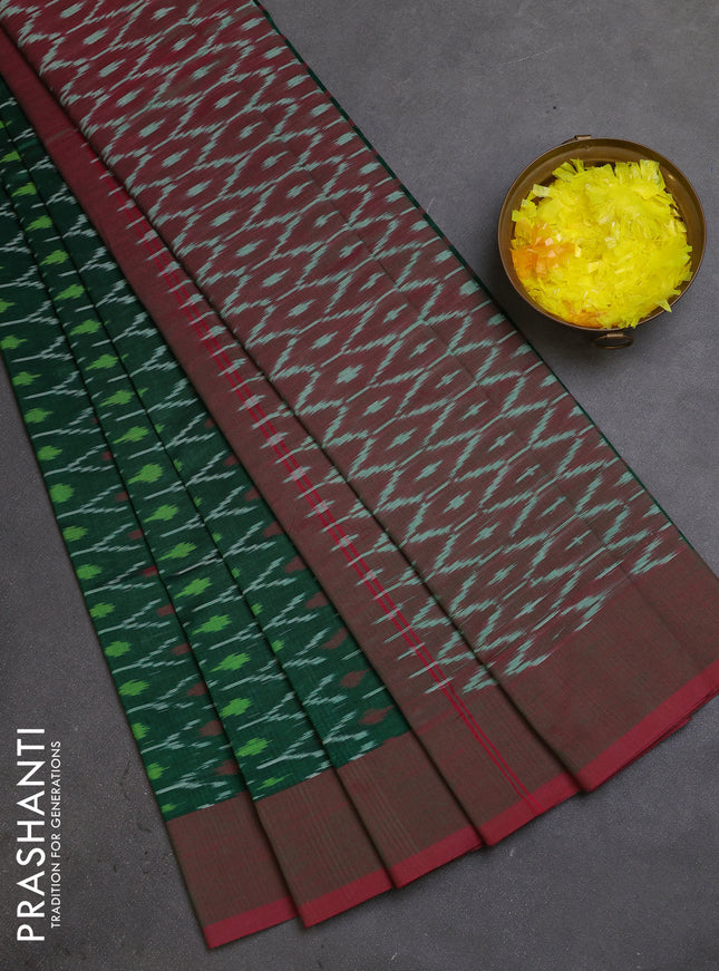 Ikat cotton saree green and dual shade of greenish maroon with allover ikat weaves and simple border