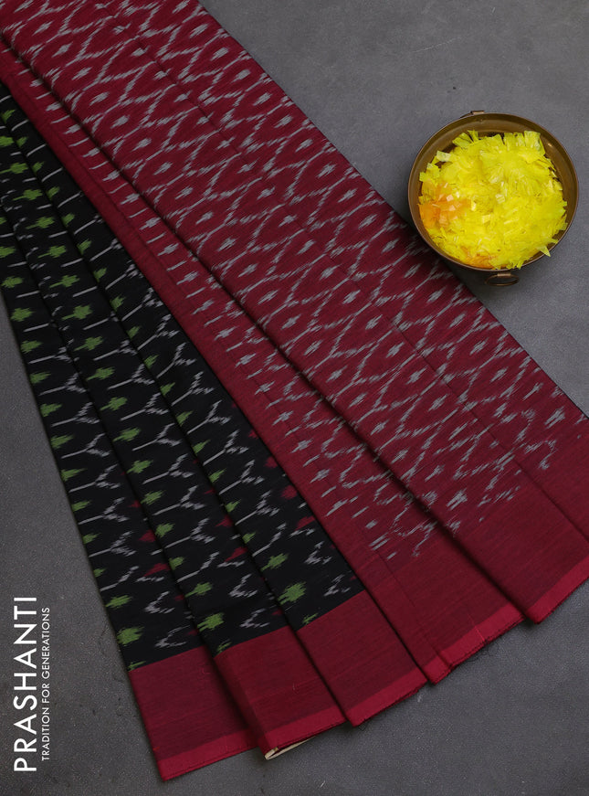 Ikat cotton saree black and maroon with allover ikat weaves and simple border