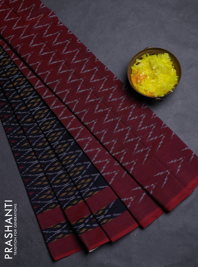 Ikat cotton saree black and maroon with allover ikat weaves and rettapet ikat border