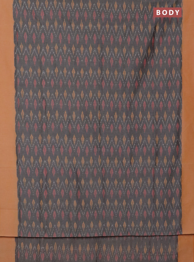 Ikat cotton saree grey and pale orange with allover ikat weaves and simple border