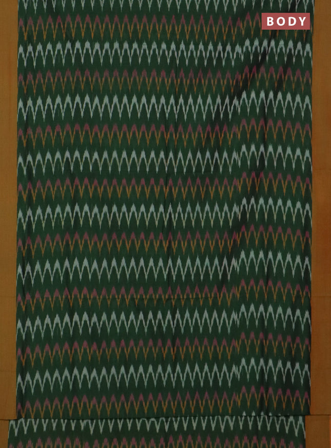 Ikat cotton saree bottle green and dark mustard with allover ikat zig zag weaves and simple border