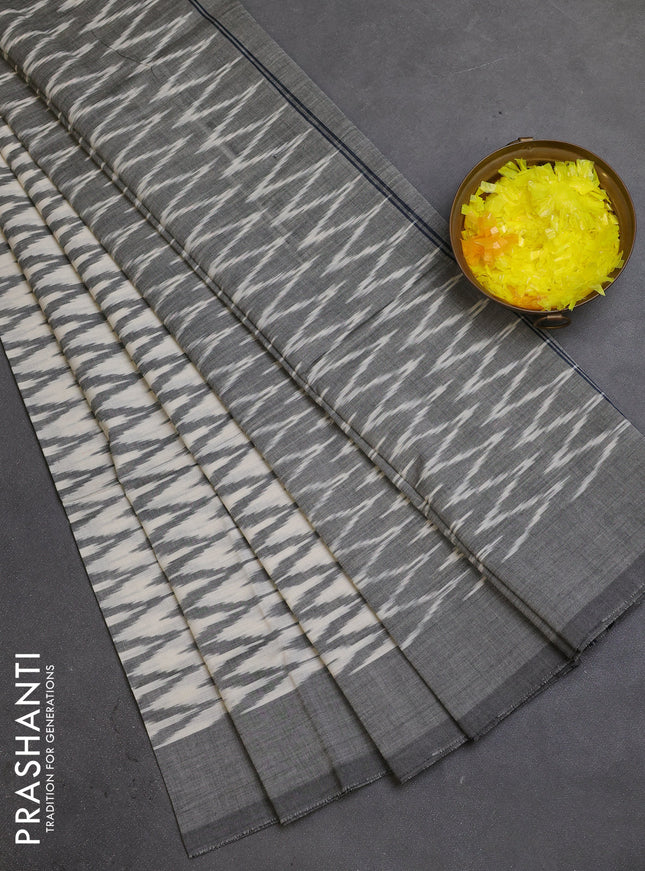 Ikat cotton saree cream and grey with allover ikat zig zag weaves and simple border